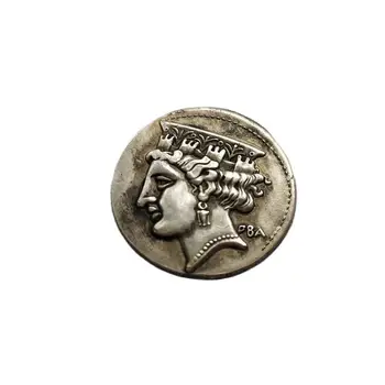 Монеты-копии весом 76 граммов, покрытые древним греческим серебром
